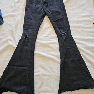 Black Flared Jeans with Distressed Details